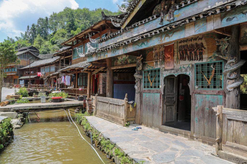 Huanggang Dong village, Zhaoxing, Guizhou, China_Architecture on the road